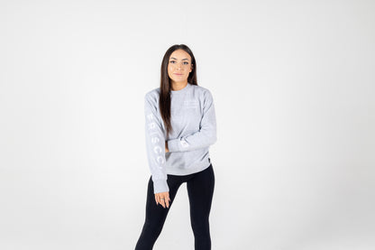 Frisco Women's activewear small longsleeve crew top in grey with white embroidery, shown from front